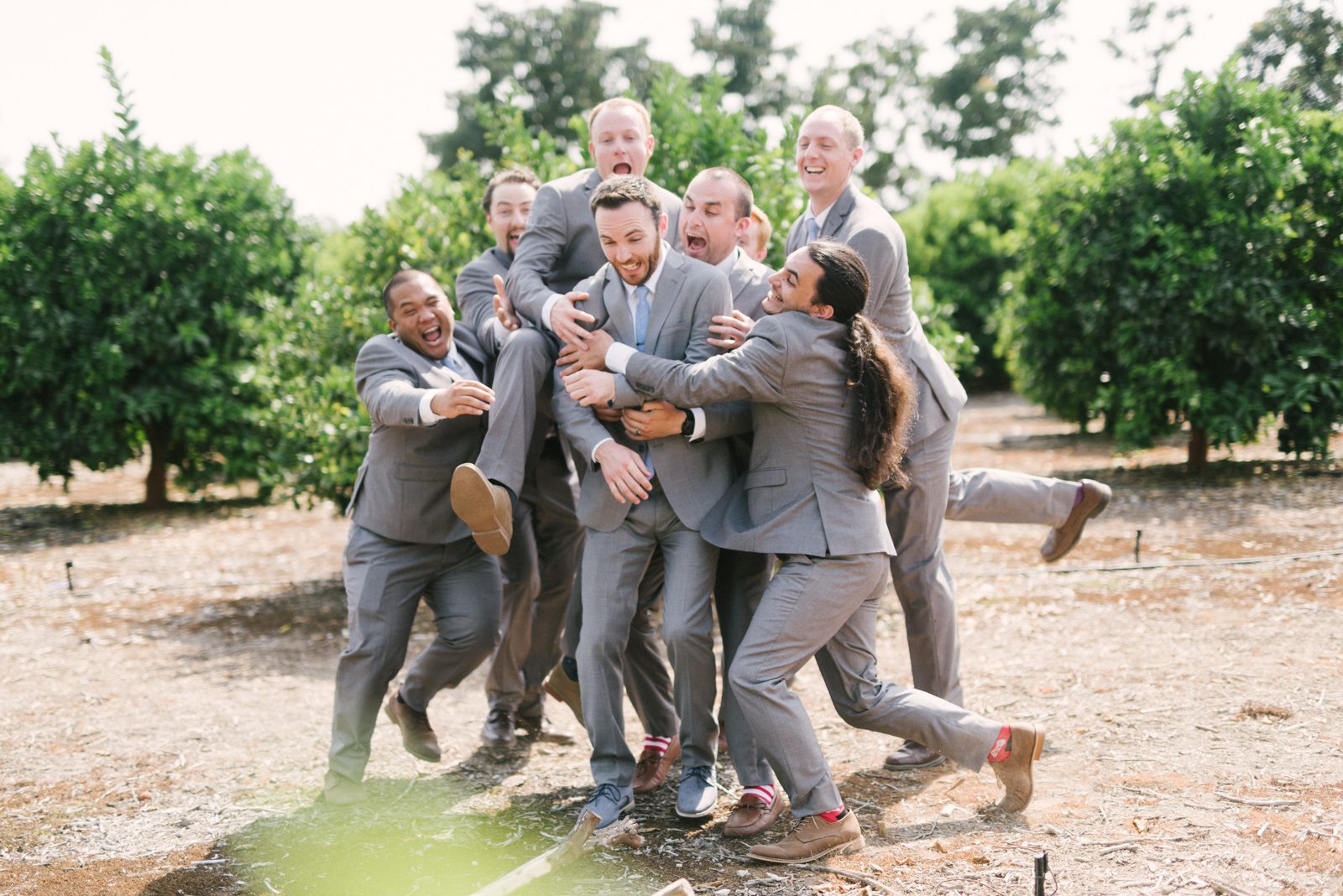 Fun groomsmen photo at Limoneira Ranch Wedding by Paso Robles Wedding Photographer Yvonne Goll Photography