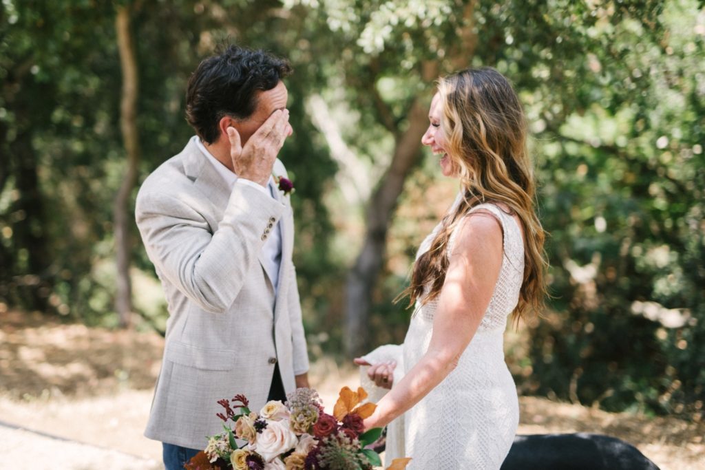 bride and groom share their first look at flying caballos ranch. slo wedding photographers