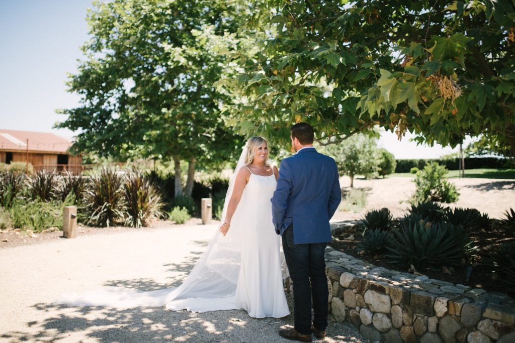 bride and groom share their first look at marfarm. yvonne goll photography