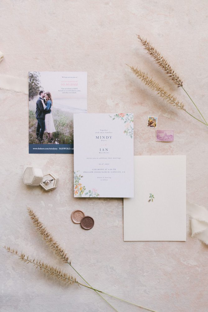 cayucos wedding invitation suite flat lay