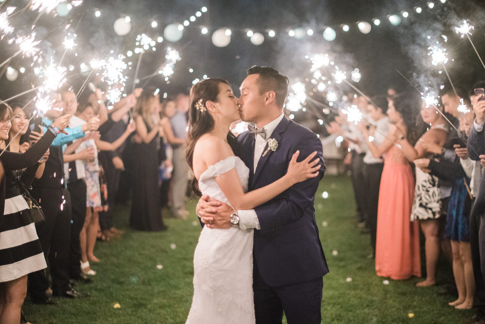 Bride and groom kiss under sparklers at Hartley Farm Wedding by Central Coast Wedding photographer Yvonne Goll Photography
