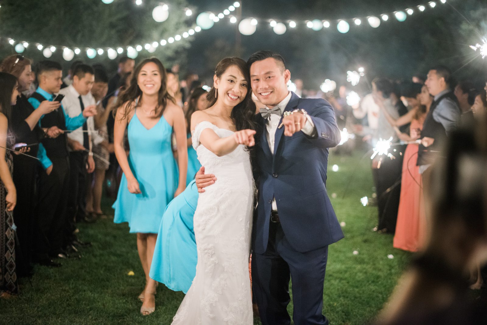 Bride and groom with sparklers at Hartley Farm Wedding by Paso Robles Wedding photographer Yvonne Goll Photography