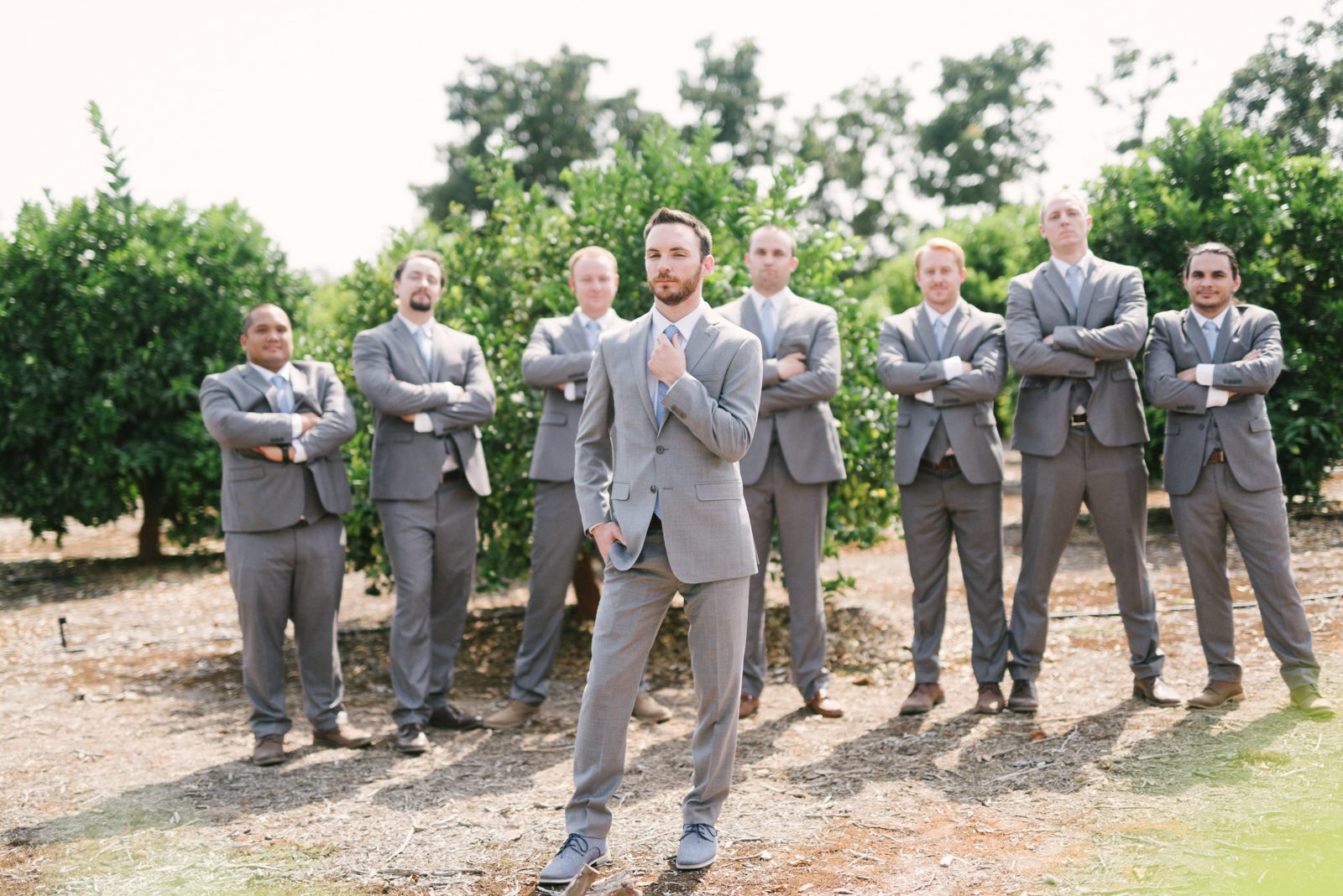 Groom and groomsmen at Limoneira Ranch Wedding by SLO Wedding Photographer Yvonne Goll Photography