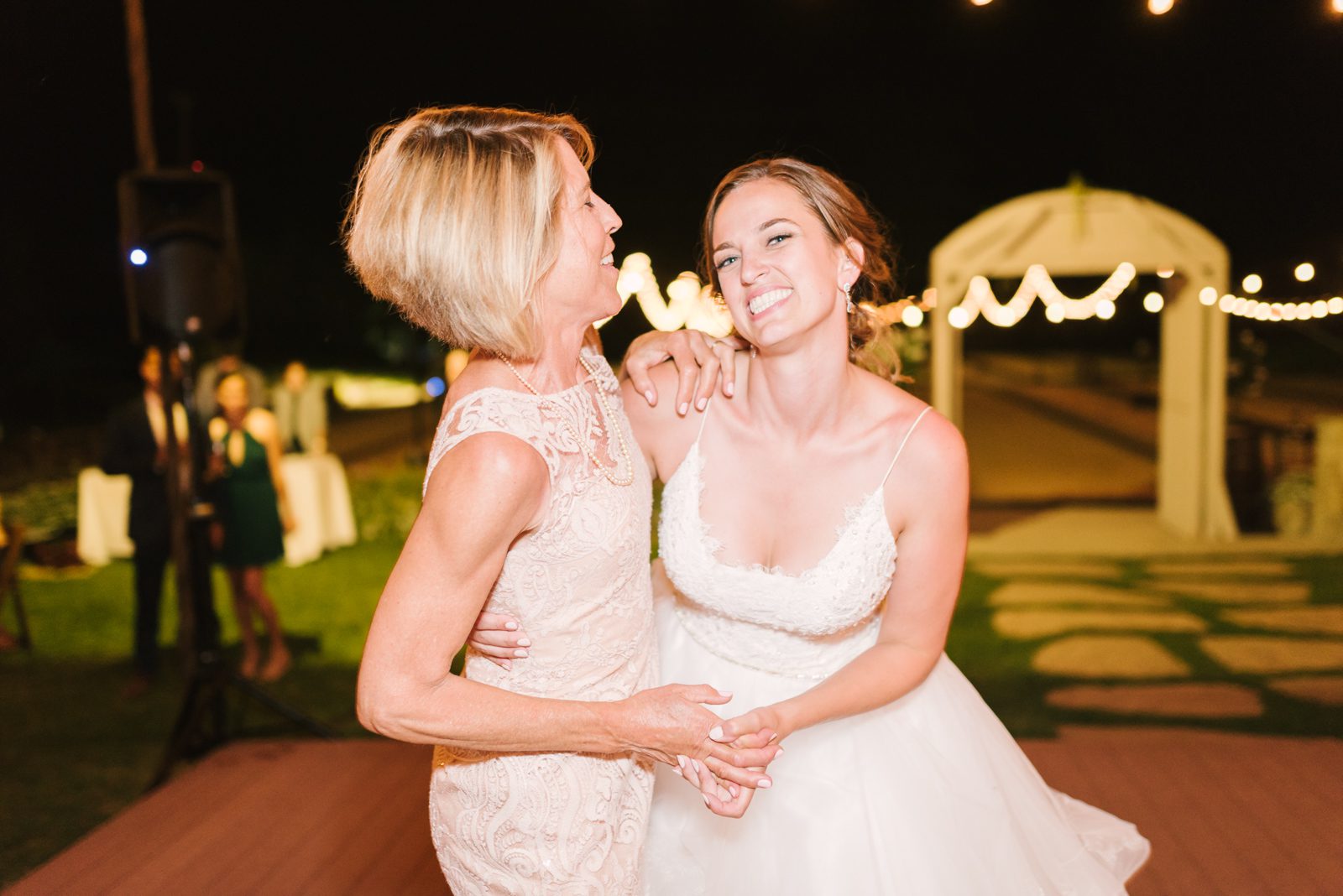 Bride and mom dancing at Limoneira Ranch Wedding by SLO Wedding Photographer Yvonne Goll Photography
